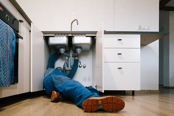 Professional Plumbing technician working in Newhall, IA